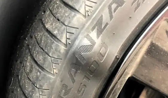 A bubble or bulge on the sidewall is a sign of internal failure and a serious safety hazard. Photo by Elisha Terada on Unsplash.
